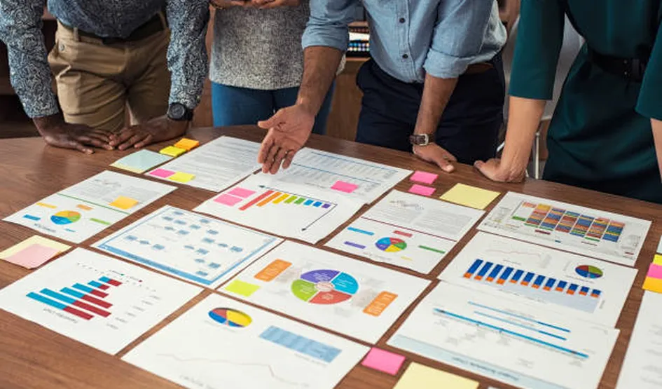 Entrepreneur analyzing charts and graphs